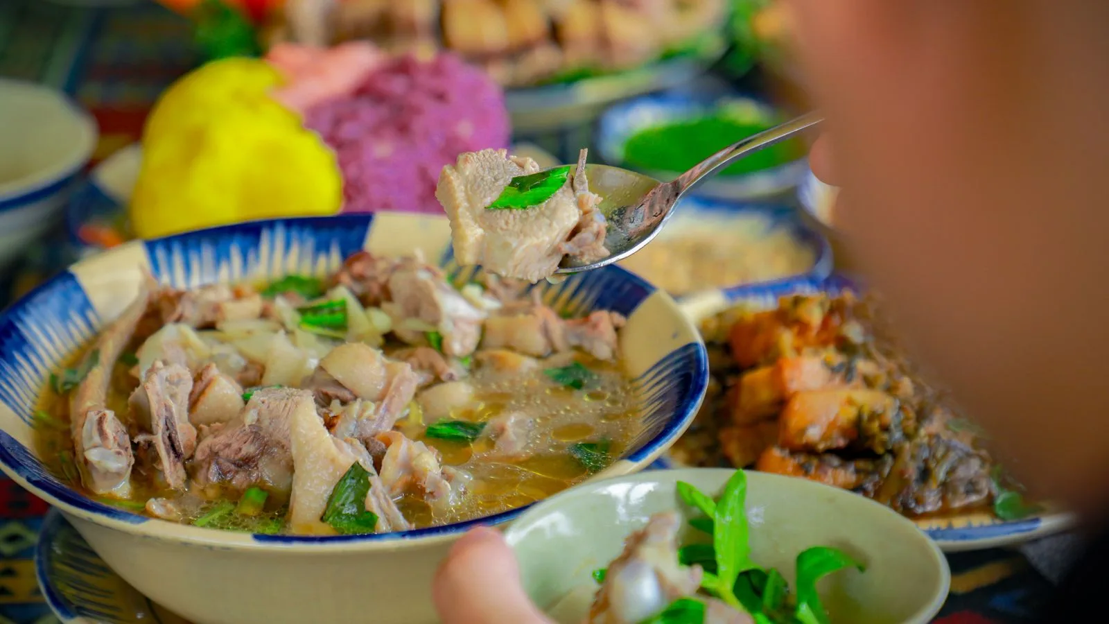 Delicious traditional Vietnamese duck soup with bamboo shoots served in a vibrant setting, showcasing authentic cuisine.