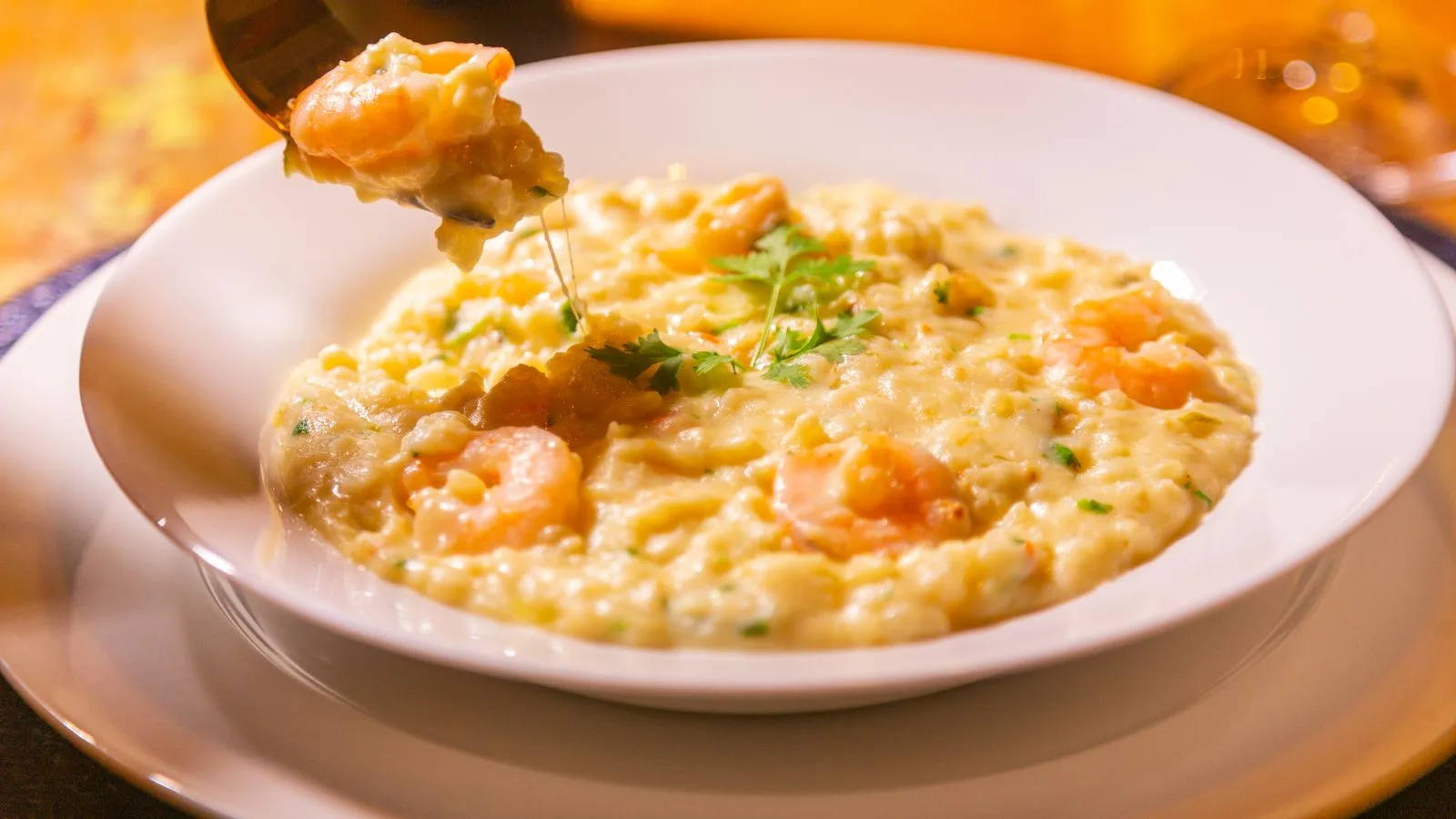 A delectable shrimp risotto garnished with herbs, perfect for a gourmet meal.